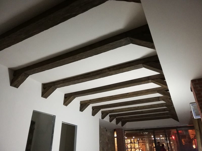Vaulted Corridor Ceiling with Faux Timber Rafters