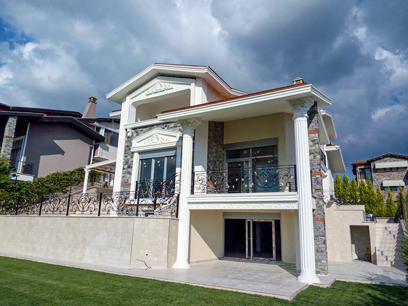 Stone Clad Luxury Villa Facade with Portico Columns