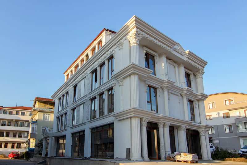 Multi-Story Commercial Facade with Fluted Pilasters