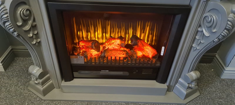Ornate Grey Fireplace Surround with Electric Flame Insert