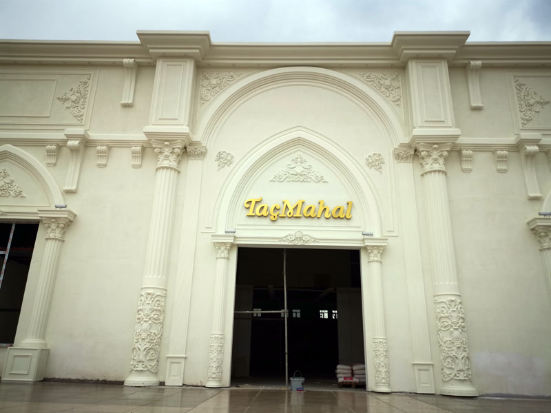 Cream Event Hall Facade with Grand Arched Portal