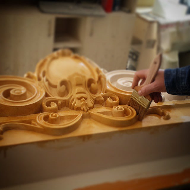 Applying Gold Wood Stain to Carved Polyurethane Crest