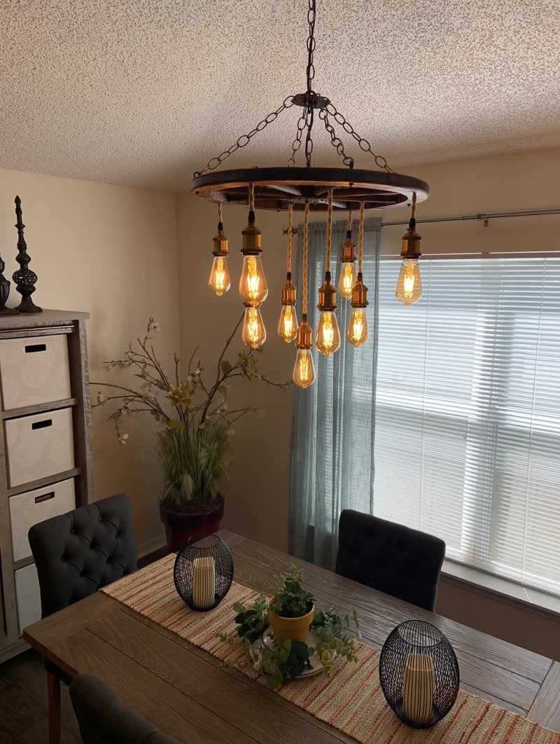 Wagon Wheel Chandelier Over Dining Table