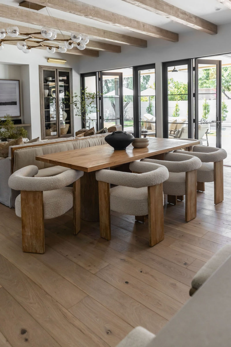 Oblique Photo of Organic Dining Room with Bouclé Chairs