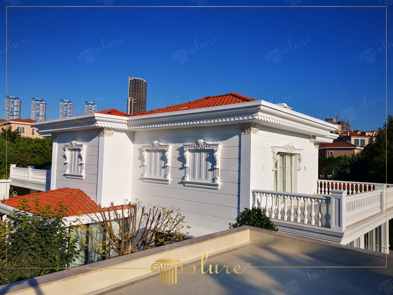 High Angle Photo of White Villa Roofline with Balustrade