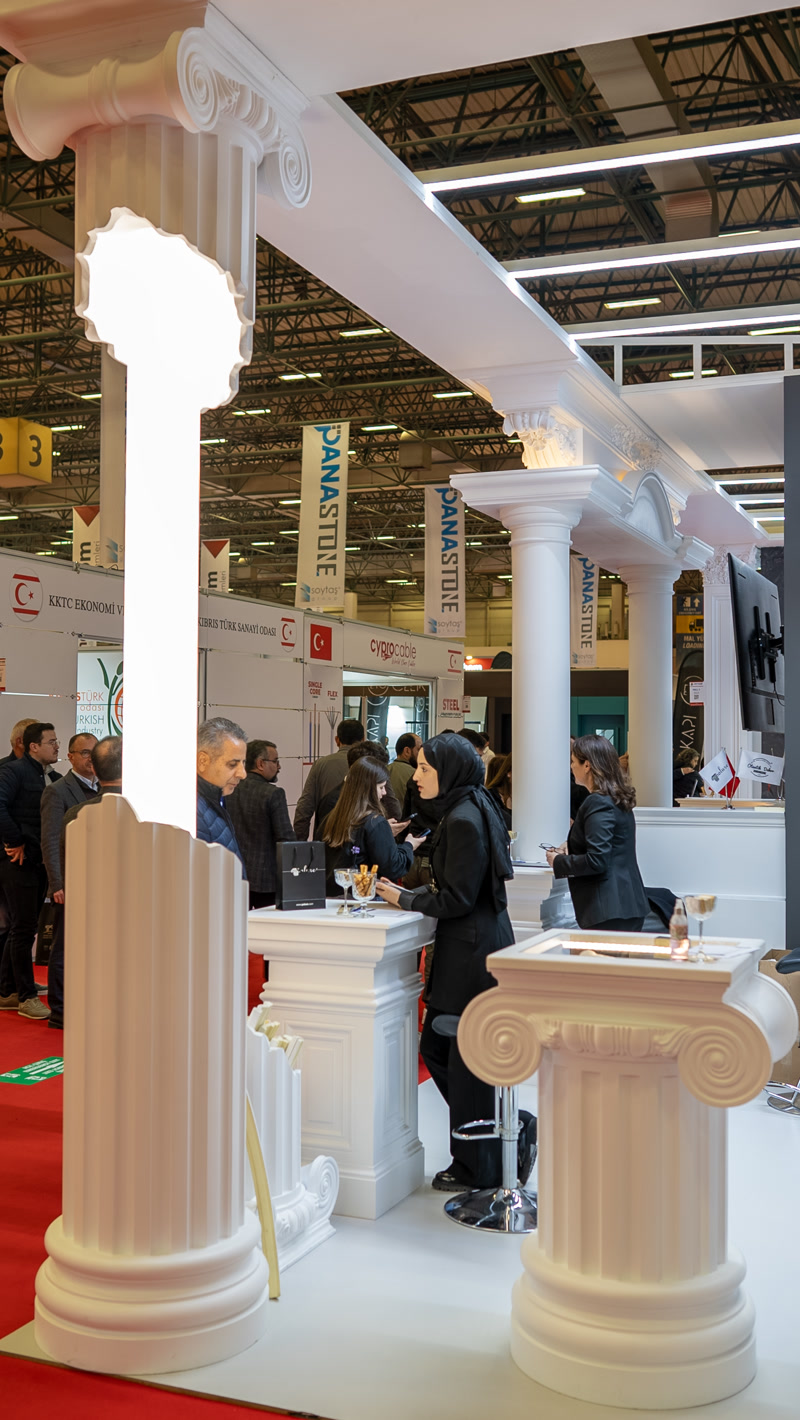 Oblique Photo of Trade Show Fair Stand with Visitors