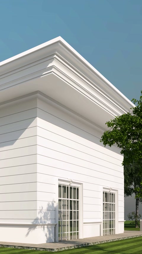 Coin de villa blanche finalisé avec des corniches superposées et des moulures horizontales