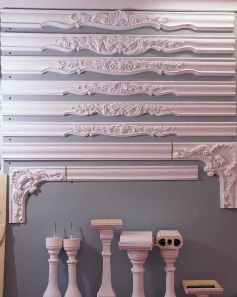 Display board presents layered border moulding designs for comparison