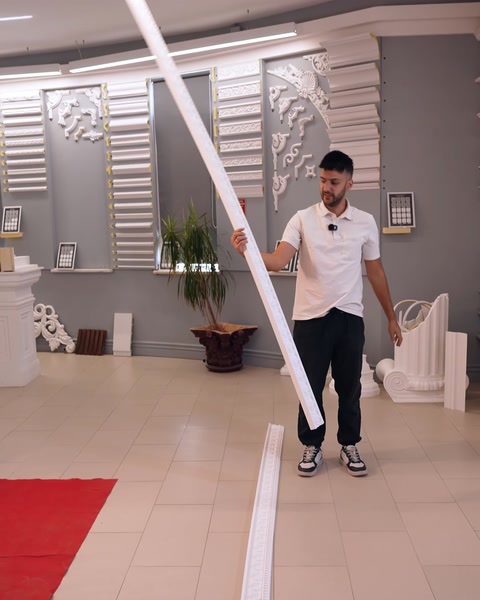 Rigid border length is shown extended across the showroom floor