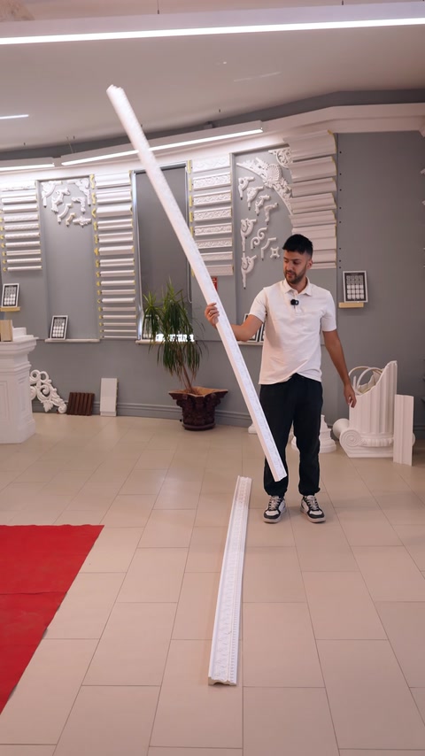 Rigid border length is shown extended across the showroom floor