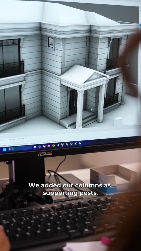 Le rendu de l'entrée comprend des colonnes décoratives sous l'auvent ajouté