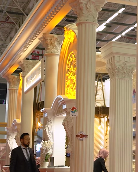 Illuminated polyurethane columns and arch decorate exhibition stand interior