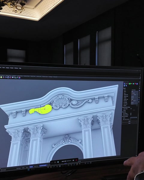 3D vizualizace zvýrazňuje detail spirály akantů na vrcholu zakřiveného frontónu