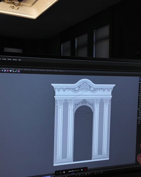 Monitor zobrazuje hotový bílý 3D portálový model z předního úhlu