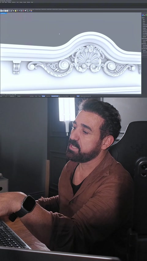 Κοντινό πλάνο κορνίζας με κεντρική χάραξη μοτίβου κοχυλιού