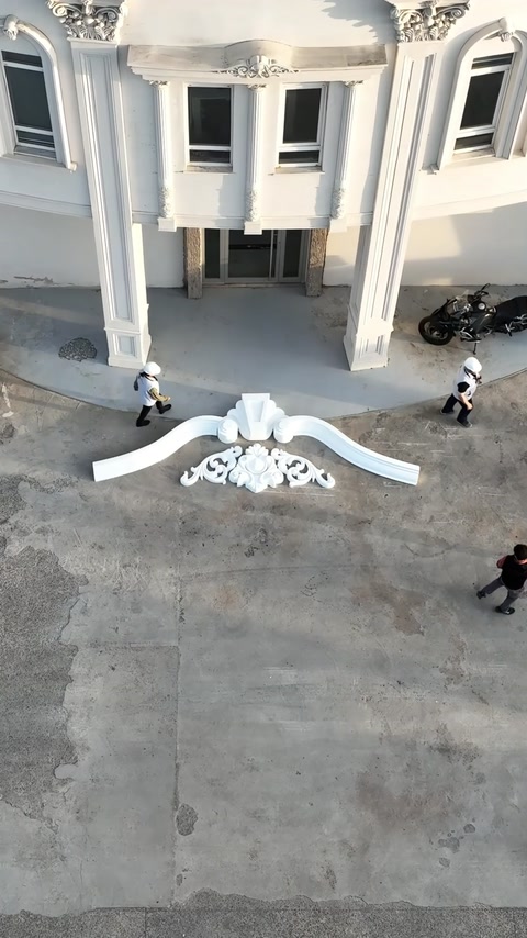 Facade Pediments Assembled on the Ground: Two Compositions, One Design Logic