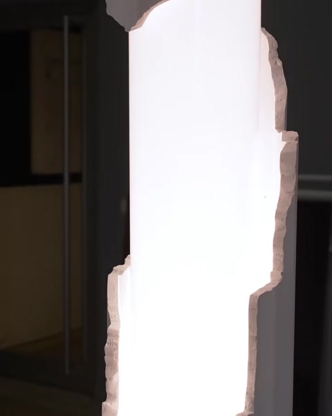 Close-up of polyurethane column cladding with bright LED edge glow