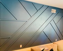 Modern classic living room accent wall with asymmetrical polyurethane trim