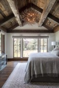 Rustic Polyurethane Ceiling Beams and Antler Chandelier Bedroom Design