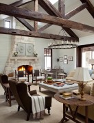 Rustic Living Room with Polyurethane Antique Wood Beams and Cozy Fireplace