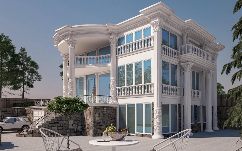 Villa classica con rivestimento esterno in poliuretano e colonne decorative <h2>Design classico con materiali moderni</h2><p>Il rivestimento in <strong>poliuretano</strong> permette di ottenere un’estetica ricca e resistente, con linee nette e finiture accurate. Questo materiale moderno si combina perfettamente con elementi tradizionali, come le colonne scanalate e i capitelli decorati tipici dell’architettura classica.</p><p>L’edificio presenta una base in pietra naturale che sostiene i livelli superiori, creando un effetto di solidità e contrasto cromatico. Le ampie superfici vetrate assicurano luminosità agli ambienti interni, mantenendo in equilibrio il gioco tra trasparenza e struttura.</p><h2>Dettagli e motivi architettonici</h2><p>Le balaustre e le cornici richiamano motivi geometrici e floreali, che arricchiscono il prospetto della villa. I decori scolpiti sulle colonne evocano suggestioni <strong>neoclassiche</strong>, richiamando gli ordini <strong>dorico</strong>, <strong>ionico</strong> e <strong>corinzio</strong>. Questi dettagli armonizzano la simmetria dell’edificio e gli conferiscono un carattere distintivo.</p><p>Un breve aneddoto storico: nell’antica Grecia le colonne ioniche con volute erano simbolo di equilibrio e raffinatezza, elementi oggi reinterpretati con materiali contemporanei come il poliuretano. Questo approccio crea design che unisce passato e presente.</p><h2>Armonia e funzionalità</h2><p>Oltre al valore estetico, il rivestimento in poliuretano assicura leggerezza, isolamento e resistenza agli agenti atmosferici. Simmetria, proporzioni e dettagli decorativi rendono la villa un esempio di equilibrio tra <strong>eleganza</strong> e funzionalità. La presenza di balconi aggettanti e cornici lavorate arricchisce il profilo architettonico, rafforzando l’identità visiva dell’abitazione.</p>

<p>Questa villa esprime un perfetto equilibrio tra <strong>poliuretano</strong> moderno e architettura classica. Le colonne con motivi floreali scolpiti creano un impatto scenico unico. Le balaustre ornate conferiscono armonia e movimento alle facciate. Il rivestimento chiaro contrasta con la base in pietra naturale. Gli ampi infissi permettono una luminosità elegante e diffusa. I dettagli geometrici definiscono equilibrio e simmetria. Il richiamo agli ordini classici crea continuità storica. Il materiale polimerico garantisce durabilità e leggerezza. I capitelli lavorati a tema vegetale richiamano stilemi corinzi. La struttura a tre piani offre imponenza verticale. I balconi decorati assicurano profondità visiva. La distribuzione delle masse architettoniche resta proporzionata. I rilievi ornamentali donano ricchezza estetica. L’integrazione tra tradizione e innovazione è evidente. L’insieme esprime <strong>eleganza</strong> senza tempo.</p>