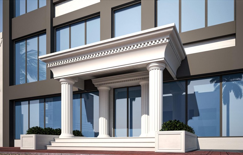 Moderne klassische Eingangsgestaltung mit Polyurethan-Säulen <h2>Architektonische Harmonie von Moderne und Klassik</h2><p>Der gezeigte Eingangsbereich verbindet eine moderne Glasfassade mit einem klassischen Portikus, dessen <strong>Polyurethan-Säulen</strong> eine klare und elegante Form aufweisen. Das Material erlaubt präzise Profile sowie eine dauerhafte witterungsbeständige Gestaltung. Die gerillte Struktur der Säulen erzeugt eine lebendige Tiefe und erinnert an dorische und ionische Vorbilder der Antike.</p><p>Über den Säulen ruht ein stark auskragendes Gebälk, das mit einem feinen <strong>Zahnschnittmotiv</strong> dekoriert ist. Dieses Muster stammt ursprünglich aus der griechischen Tempelarchitektur und wurde über Jahrhunderte hinweg in klassizistischen Gebäuden weitergetragen.</p><p>Die gesamte Komposition besteht aus weißen Stufen, einem rechteckigen Podest und elegant proportionierten <strong>Kapitellen</strong>. Seitlich platzierte Pflanzkübel aus demselben Material setzen grüne Akzente und ergänzen den architektonischen Rhythmus der Fassade.</p><h2>Gestalterische Details und Wirkung</h2><p>Die kontrastreiche Kombination aus hellen Oberflächen und der dunklen Glasfassade verstärkt die visuelle Tiefe. Das Spiel von Licht und Schatten auf den gerillten <strong>Säulen</strong> verleiht dem Eingangsbereich eine plastische und repräsentative Wirkung. Die geometrischen Formen, insbesondere die rechteckigen Flächen in Verbindung mit den runden Säulenschäften, schaffen eine ausgewogene Balance zwischen Strenge und dekorativer Vielfalt.</p><p>Insgesamt ergibt sich ein Eingang, der sowohl zeitlose <strong>Eleganz</strong> als auch moderne Klarheit vermittelt und als markantes architektonisches Detail in urbanen Projekten eingesetzt werden kann.</p>
<p>Dieser Eingang verbindet klassische Säulen mit moderner Geradlinigkeit. Die weißen <strong>Polyurethan-Säulen</strong> tragen ein fein gestaltetes Gebälk. Das Zahnschnittmotiv zeigt historische Inspiration. Die gerillten Schäfte erinnern an antike Architektur. Pflanzkübel lockern die Strenge auf. Breite Stufen verstärken die repräsentative Wirkung. Der Kontrast von hell und dunkel schafft Tiefe. Licht und Schatten beleben die Flächen. Hochwertiges Polyurethan sichert Langlebigkeit. Moderne Fassaden werden dadurch veredelt. Klassische <strong>Eleganz</strong> trifft funktionales Design. Die Kombination wirkt sowohl einladend als auch monumental. Die <strong>Kapitelle</strong> setzen dezente Akzente. Das Ensemble ist vielseitig einsetzbar. Architektur und Dekoration verschmelzen hier harmonisch.</p>