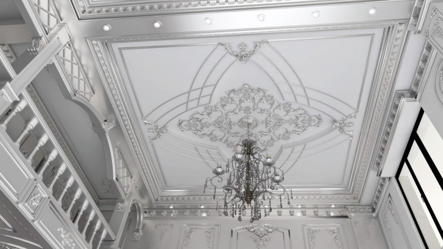 Poliurethaan klassieke plafond- en zuildecoratie voor binnenruimtes <h2>Klassieke verfijning in poliurethaan</h2><p>Het plafond is een meesterwerk van <strong>poliurethaan</strong> decoratie, waarin sierlijke <strong>ornamenten</strong> en geometrische lijnen harmonieus samenkomen. De symmetrie rond het middelpunt geeft rust en orde, terwijl de elegante <strong>kroonluchter</strong> het geheel versterkt.</p><p>De randen zijn afgewerkt met fijn gedetailleerde <strong>lijsten</strong>, waarin bloemmotieven en klassieke figuren zijn verwerkt. Deze stijl is verwant aan historische interieurs waarin de Dorische en Ionische tradities soms met decoratieve pracht werden gecombineerd. Het zorgt voor een gevoel van continuïteit tussen verleden en heden.</p><p>Tussen de lijnen en siermotieven zijn subtiele geometrische patronen zichtbaar die diepte en compositie aan de ruimte toevoegen. De combinatie van symmetrische vlakken, gedraaide kolomelementen en verfijnde reliëfs creëert een unieke elegantie.</p><ul><li>Luxe uitstraling door rijk gedetailleerde ornamentiek</li><li>Duurzaam en licht materiaal dankzij <strong>poliurethaan</strong></li><li>Sfeer van klassieke grandeur in moderne context</li></ul>

<p>Deze plafonddecoratie in <strong>poliurethaan</strong> toont de verfijning van klassieke interieurs. De symmetrische compositie benadrukt de harmonie in de ruimte. Het gebruik van sierlijke <strong>ornamenten</strong> versterkt het gevoel van luxe. De geometrische lijnen voegen structuur en ritme toe. De elegante <strong>kroonluchter</strong> vormt het centrale ankerpunt. Klassieke bloemmotieven verspreiden zich vanuit het middelpunt. Fijn bewerkte <strong>lijsten</strong> accentueren de overgang tussen plafond en muren. Gladde oppervlakken contrasteren met rijke details. Lichtreflecties vergroten het gevoel van diepte. De combinatie van moderne technieken en klassieke kunst biedt duurzaamheid. Het materiaal is licht maar zeer stevig. Subtiele bogen en patronen geven ritmische elegantie. Deze stijl brengt verleden en heden samen. Het geheel ademt een sfeer van tijdloze grandeur. Dit maakt de decoratie ideaal voor woningen en representatieve ruimtes.</p>