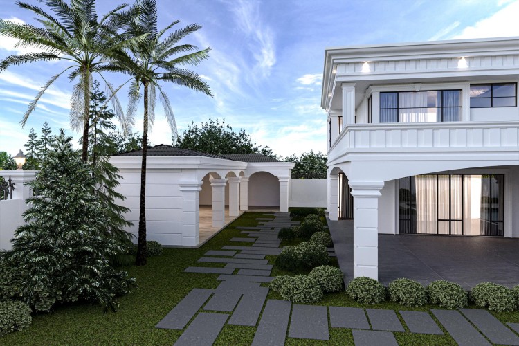 Poliurethan Luxus Villa Außenfassade mit klassischem Design <h2>Klassische Villa mit Poliurethan-Dekor an der Außenfassade</h2><p>Die abgebildete Villa präsentiert eine elegante Komposition aus <strong>klassischem Dekor</strong>, strenger Symmetrie und modernen Materialien. Poliurethan wird hier eingesetzt, um feine Profile, kannelierte Säulen und klare Gesimse zu realisieren, die traditionell handgearbeitete Strukturen nachempfinden.</p><p>Die Fassade zeichnet sich durch einen rhythmischen Wechsel von <strong>Arkaden</strong> und rechteckigen Fensterflächen aus. Arkaden sind ein historisches Gestaltungselement, das bereits in der römischen Architektur häufig verwendet wurde, um Leichtigkeit mit Monumentalität zu verbinden.</p><p>Der Eingangsbereich ist mit einer Reihe von Bögen betont, die auf kräftigen Pfeilern ruhen. Ergänzend dazu unterstreichen horizontale Gliederungen im Obergeschoss die Struktur und heben das <strong>klassische Fassadendesign</strong> hervor.</p><p>Der Gartenweg besteht aus dunklen rechteckigen Platten, die in versetzter Geometrie angeordnet sind. Diese <strong>geometrische Pflasterung</strong> kontrastiert zur ruhigen weißen Fassade und bringt eine moderne Komponente ins Gesamtbild.</p><p>Flankiert wird die Architektur durch üppige Bepflanzung mit Palmen, immergrünen Sträuchern und symmetrischen Hecken, die mediterrane Gelassenheit und luxuriöse Repräsentativität vermitteln.</p>
<p>Diese luxuriöse Villa zeigt eine klare Kombination aus moderner und klassischer Gestaltung. Die Fassade ist mit <strong>Poliurethan</strong>-Elementen verziert. Säulen und Gesimse betonen den harmonischen Stil. Der Einsatz von <strong>Arkaden</strong> sorgt für Monumentalität. Historische Bezüge machen die Architektur tiefgründig. Die weiße Oberfläche wirkt leicht und elegant. Ein moderner Akzent entsteht durch <strong>geometrische Pflasterung</strong>. Die rechteckigen Platten erzeugen Dynamik im Eingangsbereich. Symmetrisch angelegte Sträucher rahmen den Weg. Palmen und mediterrane Vegetation geben Erhabenheit. Die Balance von Architektur und Natur ist spürbar. Der Außenbereich vermittelt ein repräsentatives Gesamtbild. Klassizistische Elemente steigern die Exklusivität. Die Kombination von Tradition und Moderne ist gelungen. Diese Gestaltung unterstreicht luxuriösen Wohnkomfort.</p>