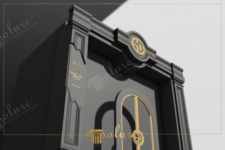 Poliurethan Außengeschäft Fassade und klassisch-moderne Eingangstür <h2>Klassisch-moderne Eingangsgestaltung mit Poliurethan</h2><p>Die Türanlage zeigt eine klare Balance zwischen <strong>klassischer Symmetrie</strong> und modernen Formen. Die Vergoldungen an den Linien und Symbolen kontrastieren elegant mit der dunklen Grundfarbe und betonen die geometrischen Strukturen.</p><p>Das obere Mittelornament mit rundem Emblem erinnert dezent an historische Fassaden, in denen ähnliche Medaillon-Formen verwendet wurden. Gleichzeitig verleiht der schlichte Rahmen der Tür einen <strong>modernen</strong> Charakter, der gut zu Geschäftseingängen passt.</p><p>Die vertikalen Flächen sind mit <strong>Profilierungen</strong> versehen, die an klassizistische Rahmungen erinnern. In der Architekturgeschichte sind solche Details bereits seit den griechisch-römischen Bautraditionen bekannt und werden hier in einer zeitgemäßen Umsetzung eingesetzt.</p><p>Besonders auffällig ist die Kombination aus tiefschwarzen Flächen und goldfarbenen Ornamenten. Diese Komposition vermittelt ein Gefühl von <strong>Eleganz</strong> und Prestige, während der symmetrische Aufbau Klarheit und Struktur schafft.</p><ul><li>Geometrische Linienführung und Ornamentik</li><li>Verwendung von Poliurethan als edles Fassadenmaterial</li><li>Kombination aus Tradition und Moderne</li><li>Luxuriöser Gesamteindruck</li></ul>

<p>Dieses moderne Eingangstürdesign verbindet <strong>Poliurethan</strong> mit klassischer Formensprache. Die dunkle Oberfläche wird durch goldfarbene Details akzentuiert. Ein mittiges rundes Emblem verleiht architektonische Bedeutung. Die klaren Rahmungen erzeugen einen strukturierten Eindruck. Die feinen <strong>Profile</strong> erinnern an traditionelle Baukunst. Gleichzeitig wirken die Linien reduziert und modern. Dadurch entsteht ein spannender Kontrast. Der Einsatz von Metalloptik steigert die exklusive Ausstrahlung. Zudem betonen geometrische Formen die Symmetrie. Der repräsentative Charakter eignet sich für Geschäftsgebäude. Auch Wohnhäuser erhalten so ein elegantes Eingangstor. Die Kombination klassischer Gesimse mit neuen Materialien wirkt zeitlos. Luxuriöse Details setzen bewusste Akzente. <strong>Eleganz</strong> und Dauerhaftigkeit stehen im Vordergrund. Dieses Design vereint <strong>Tradition</strong> und moderne Strenge auf harmonische Weise.</p>