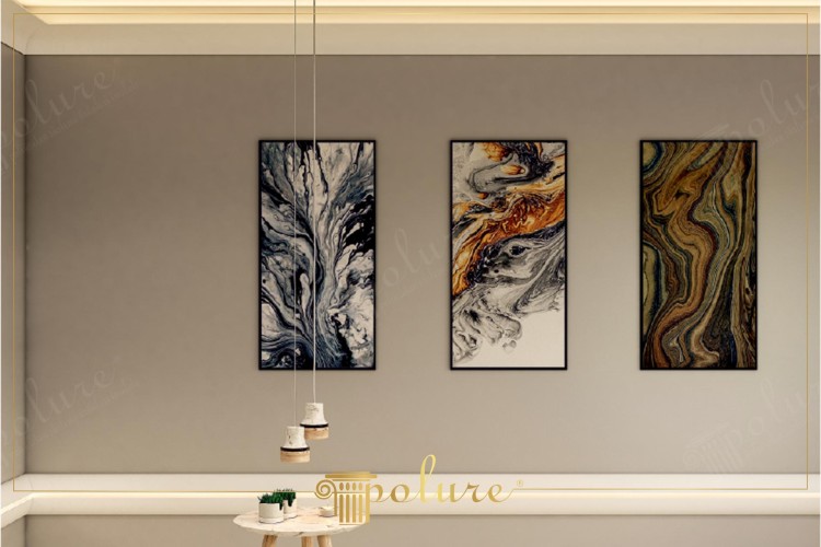 Polyurethane Wall Art with Modern and Classic Interior Decoration Ideas <h2>Polyurethane in Modern and Classic Interiors</h2><p>Polyurethane elements are increasingly embraced in interior design due to their durability and ability to achieve both <strong>modern</strong> and <strong>classic</strong> expressions. In this example, the use of abstract wall panels illustrates how polyurethane can replicate the natural feel of <strong>marble-like patterns</strong> while providing lightweight and practical solutions.</p><p>The displayed artworks present three different approaches: a monochrome swirl of black and gray reminiscent of stone textures, a vibrant mix with fiery orange and gold layers, and an earthy flow of brown, green, and deep blue curves. Each piece introduces organic <strong>geometric motifs</strong> and fluid shapes that enhance visual dynamism in the space.</p><h2>Harmony of Light and Structure</h2><p>Minimalist ceiling lights, neutral wall tones, and a balanced furniture choice complement the strength of the panels. This interplay of structured surfaces and dynamic artwork demonstrates how polyurethane crafted decor can fit both modern restraint and classical richness.</p><p>Historically, wall reliefs and stone inlays were traditional methods of adding texture to rooms. Polyurethane now allows similar effects with easier installation and more flexibility in design choices, bridging historical inspiration with contemporary practicality.</p><ul><li>Durable materials suitable for long-lasting interiors</li><li>Abstract motifs that merge art with function</li><li>Design versatility across modern and classic themes</li></ul>
<p>Polyurethane design integrates durability with aesthetic flexibility. These wall panels present swirling forms that mirror natural marble while introducing artistic dynamism. The first panel accentuates monochrome tones, creating a strong visual anchor. The second contrasts fiery orange flows with muted gray movements. The third panel emphasizes earthy streams of deep brown, green, and blue. Such compositions bring texture and vibrancy to interiors. Minimalist suspended lamps highlight the works without distraction. Ceiling illumination adds warmth and depth to the arrangement. Neutral wall colors enhance the impact of the panels. The furniture remains understated to balance the richness of surface patterns. Polyurethane pieces evoke a sense of timeless adaptability. The abstract organic designs blend tradition with modern appeal. Strong <strong>patterns</strong> echo nature’s fluidity while ensuring uniqueness. The choice of <strong>textures</strong> adds sophistication to any setting. Details in <strong>geometric</strong> flow extend classic design heritage. Overall, polyurethane wall art fuses beauty and resilience harmoniously.</p>