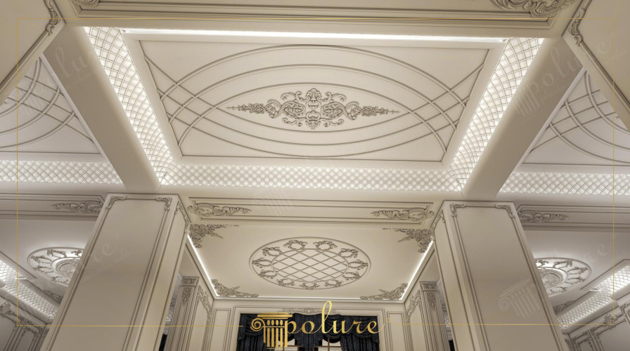 Klassisches Polyurethan Innendesign mit zeitloser Eleganz <h2>Klassische Eleganz im Innenraum</h2><p>Das vorgestellte Design aus <strong>Polyurethan</strong> vereint klassische Verzierungen mit innovativer Lichtführung. Besonders auffällig sind die reliefierten Deckenplatten mit floralen Mustern, die durch sanfte <strong>Geometrie</strong> in Form von Ovalen und Gittern ergänzt werden. Diese sorgfältig gearbeiteten Details schaffen ein Gefühl von Harmonie und Symmetrie.</p><p>Die kunstvollen Linienführungen und dekorativen Rosetten erinnern an die Ornamentik des 18. und 19. Jahrhunderts, als repräsentative Innenräume vor allem durch Stuck und handgearbeitete Verzierungen geprägt waren. Polyurethan ermöglicht es jedoch, diese aufwendige Optik dauerhaft und pflegeleicht umzusetzen.</p><h2>Gestaltung und Atmosphäre</h2><p>Elegante <strong>Reliefmuster</strong> an den Deckenfelder bieten ein reiches Spiel aus Licht und Schatten. Dank integrierter Beleuchtung wirken die dekorativen Details dreidimensional und unterstreichen den luxuriösen Charakter. Die Wände sind mit klassischen Paneelen und filigranen Eckornamenten gestaltet, die eine klare Struktur mit ornamentaler Pracht verbinden.</p><p>Die Verbindung von klaren Flächen und opulenten Mustern erzeugt eine ausgewogene Komposition, die sowohl in modernen als auch in traditionellen Kontexten stilvoll wirkt.</p><ul><li>Feine Linienbögen und geometrische Gitter</li><li>Oval- und Kreisornamente mit floraler Anmutung</li><li>Integrierte Lichtleisten für Tiefe und Eleganz</li></ul><p>Dieses Design eignet sich hervorragend für <strong>Dekoration</strong> von Repräsentationsräumen, klassischen Hochzeitssälen oder eleganten Empfangsbereichen, in denen zeitlose Schönheit im Vordergrund steht.</p>

<p>Dieses klassische Innendesign aus <strong>Polyurethan</strong> strahlt zeitlose Eleganz aus. Kunstvolle geometrische Formen verleihen der Decke eine harmonische Struktur. Runde und ovale Ornamente verbinden florale Leichtigkeit mit architektonischer Strenge. Durch die filigranen <strong>Reliefmuster</strong> entsteht ein luxuriöser Gesamteindruck. Dezente LED-Streifen heben die feinen Details hervor. Die Kombination aus geometrischen Gittern und floralen Arabesken ist ausgewogen. Wandpaneele mit dekorativen Eckelementen ergänzen das Konzept. Klare Linien kontrastieren reizvoll mit opulenten Motiven. Die Farbgebung in Weiß- und Creme-Tönen verstärkt den klassischen Charakter. Licht und Schatten schaffen eine eindrucksvolle Tiefe. Historische Anklänge erinnern an prunkvolle Epochen. Polyurethan garantiert zugleich moderne Beständigkeit. Der Einsatz ist ideal für <strong>Hochzeitssaal</strong> oder Empfangsbereiche. Diese Ästhetik vereint Tradition und Innovation. Das Ergebnis ist eine eindrucksvolle <strong>Dekoration</strong>, die dauerhaft fasziniert.</p>