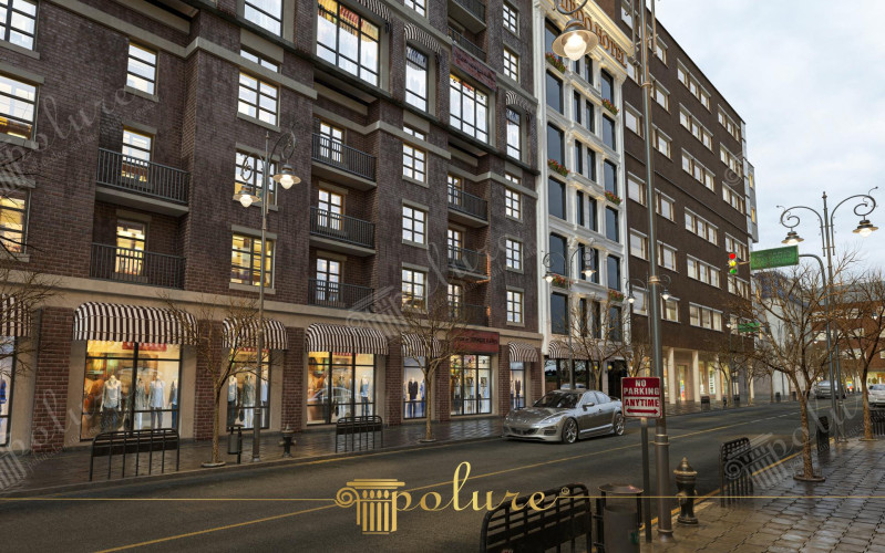 Decorazione esterna di hotel con poliuretano e design classico moderno <h2>Uso del poliuretano nella decorazione delle facciate</h2><p>Il poliuretano è un materiale noto per la sua leggerezza e resistenza, molto apprezzato nella <strong>decorazione</strong> esterna di edifici. Permette la creazione di elementi raffinati come cornici, modanature e rilievi che, una volta applicati, arricchiscono le facciate con un linguaggio visivo ricco di dettagli.</p><p>In questo esempio di facciata alberghiera, i pannelli in <strong>mattoni</strong> scuri creano una base solida e urbana, mentre il contrasto con i volumi bianchi decorati con cornici in poliuretano richiama i motivi <strong>classici</strong>. Le geometrie rettangolari delle finestre scandiscono con regolarità la facciata, conferendo equilibrio visivo.</p><h2>Dettagli stilistici e armonia visiva</h2><p>I balconi in metallo e le grandi aperture vetrate trasmettono un carattere moderno, mentre le tende a righe sulle vetrine richiamano un'estetica dal gusto tradizionale. Le <strong>fioriere</strong> integrate nei davanzali popolano lo spazio con colori naturali, contribuendo ad ammorbidire le linee della struttura.</p><p>L’uso dei dettagli decorativi in poliuretano non è solo estetico, ma anche funzionale. Questo materiale offre durabilità all’esterno e permette di realizzare intricati <strong>motivi</strong> geometrici e lineari senza appesantire la struttura.</p><h2>Storia e richiamo classico</h2><p>Le cornici e i rilievi traggono ispirazione dall’architettura classica, in cui elementi decorativi come modanature e colonne trasmettevano eleganza e armonia. L’impiego del poliuretano consente di reinterpretare questi accenti tradizionali in chiave moderna, conferendo alla facciata un'identità unica.</p><ul><li>Contrasto tra mattoni scuri e intonaco bianco</li><li>Ampie vetrate con geometrie rettangolari</li><li>Balconi metallici e cornici decorative</li><li>Dettagli floreali integrati nei davanzali</li><li>Uso del poliuretano leggero e resistente</li></ul>

<p>Il poliuretano rende le facciate alberghiere eleganti e funzionali. Questo materiale permette una <strong>decorazione</strong> raffinata con cornici e rilievi leggeri. Le superfici in <strong>mattoni</strong> scuri donano robustezza visiva. Le cornici bianche in contrasto danno un tocco <strong>classico</strong>. Le finestre rettangolari creano ritmo architettonico. I balconi metallici offrono un dettaglio moderno. Le tende a righe aggiungono una nota tradizionale. Le <strong>fioriere</strong> arricchiscono i davanzali con colore naturale. La strada urbana dona un contesto autentico. I lampioni con motivi storici valorizzano la facciata. I motivi geometrici rinforzano l’armonia complessiva. Il poliuretano garantisce resistenza agli agenti atmosferici. L’uso dei dettagli decorativi trasmette stile senza eccessi. L’insieme risulta equilibrato e accogliente. L’hotel acquisisce così un’identità memorabile e distintiva.</p>